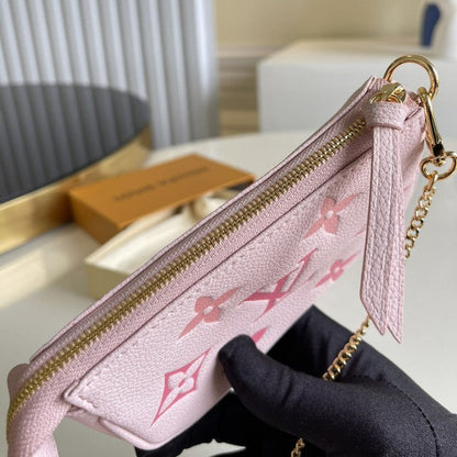 LV Monogram Empreinte Mini Pochette Accessoires Bag M80501