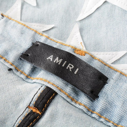 Amiri x Chemist leather stars jeans