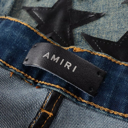 Amiri x Chemist leather stars jeans blue