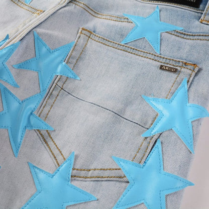 Amiri x Chemist leather stars jeans light blue