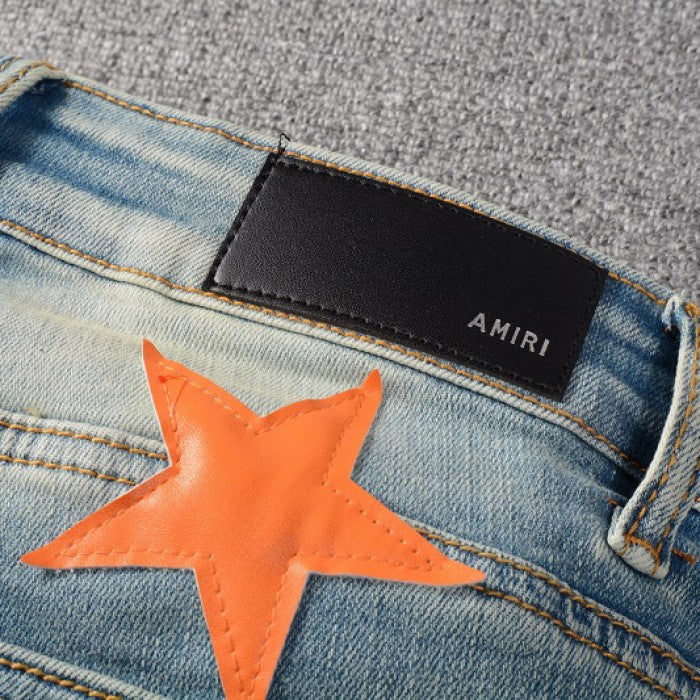 Amiri x Chemist leather stars jeans orange