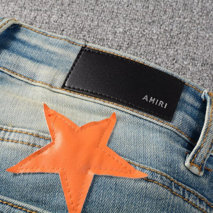 Amiri x Chemist leather stars jeans orange