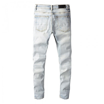 Amiri Cherub Distressed Printed Jeans Blue