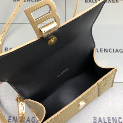 Balenciaga Women's Hourglass Xs Handbag in Gold