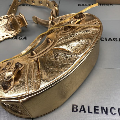 Balenciaga Women's Le Cagole Xs Shoulder Bag in Gold