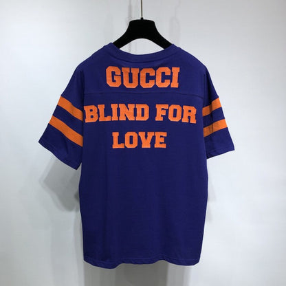 Gucci T-shirt with '25 Gucci Eschatology and Blind for Love 1921' print blue