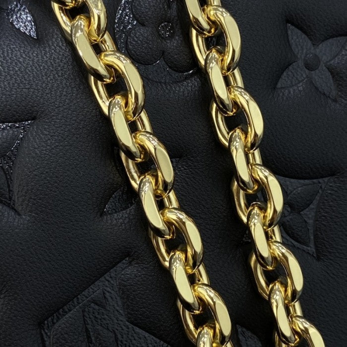 LV Monogram Embossed Pochette Coussin Black M80742