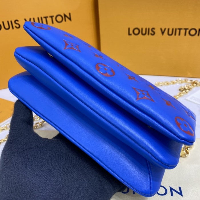 LV Monogram Embossed Pochette Coussin Blue M80743