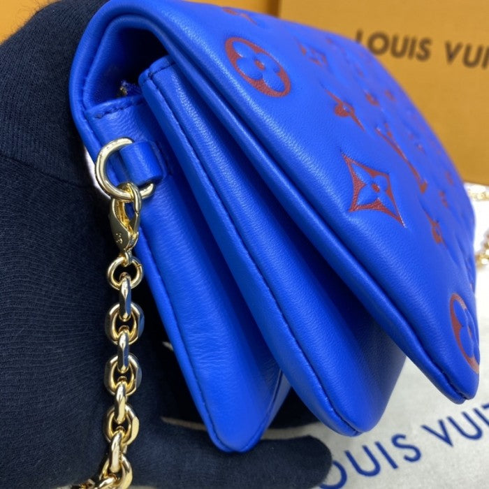 LV Monogram Embossed Pochette Coussin Blue M80743