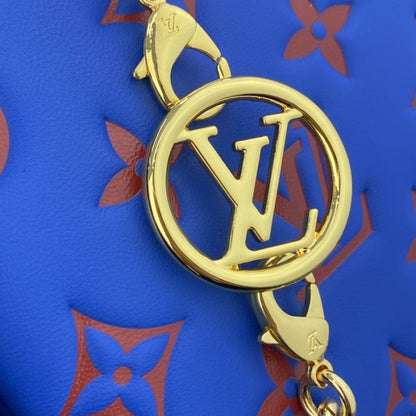 LV Monogram Embossed Pochette Coussin Blue M80743