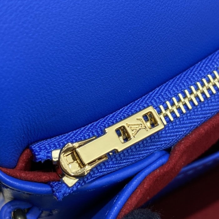 LV Monogram Embossed Pochette Coussin Blue M80743