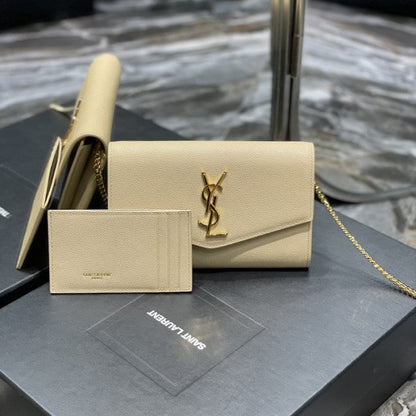 Saint Laurent uptown chain wallet in grain de poudre embossed leather beige