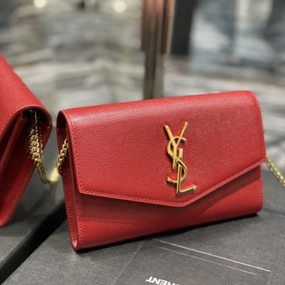 Saint Laurent uptown chain wallet in grain de poudre embossed leather red