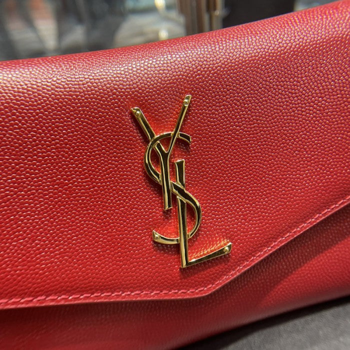 Saint Laurent uptown chain wallet in grain de poudre embossed leather red