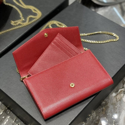 Saint Laurent uptown chain wallet in grain de poudre embossed leather red